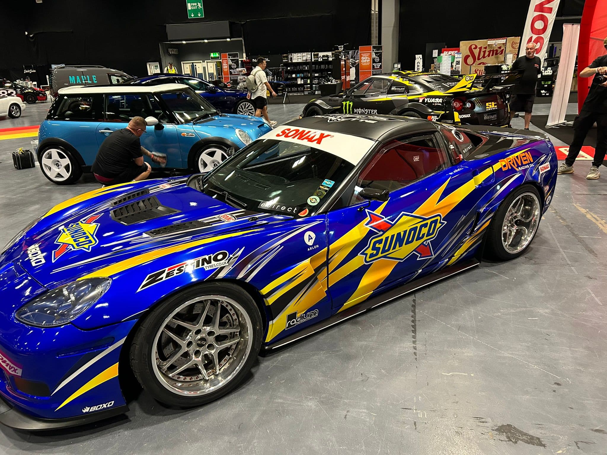 Blue Corvette race car at show